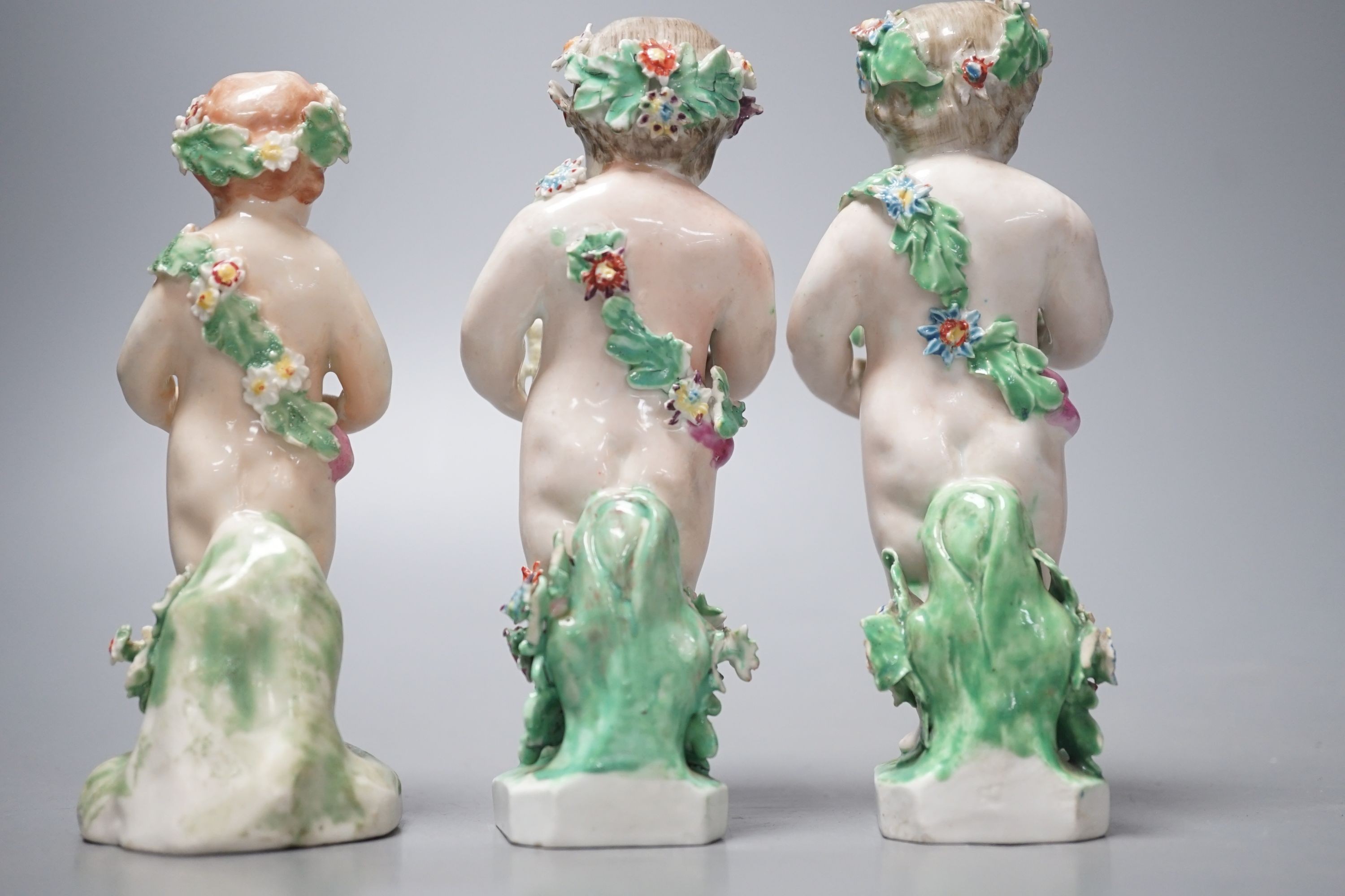 Three late 18th century Derby porcelain cherubs, 15cm